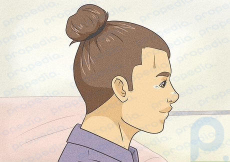 Step 2 Tie your hair into a man bun for a messy yet swoon-worthy look.