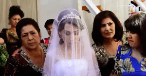 Groom in Uzbekistan hit his bride on the head after losing in a wedding competition: video
