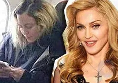 Madonna sem maquiagem e penteado não se destacou entre os passageiros da classe econômica