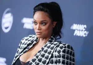 Time is powerful: 45-year-old supermodel Tyra Banks showed off her flabby neck and wig