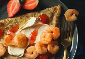Black caviar and shrimp with strawberries: try pancakes with unusual fillings at Pripyok!