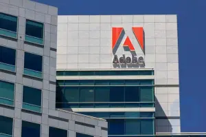 Adobe supera estimativas de ganhos, ações atingem novo recorde