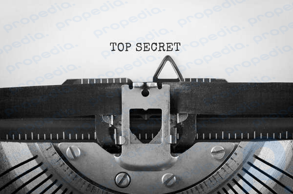 Texto Top Secret escrito en una máquina de escribir retro