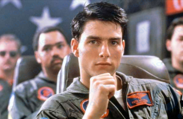 Tom Cruise als Maverick in Top Gun (1986) unter der Regie von Tony Scott.