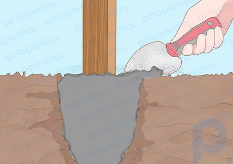 Schritt 5 Füllen Sie das Loch mit Zement, bis es auf gleicher Höhe mit dem Boden ist.