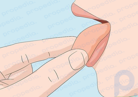 Step 2 Lick your fingers.