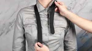 How to Tie a Tie on Someone Else