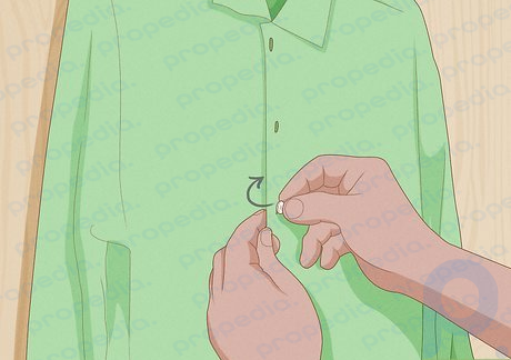 Step 8 Unbutton your clothes.