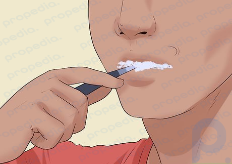 Step 23 Brush your teeth regularly and invest in breath sprays or mints when you are leaving the house and eating out.