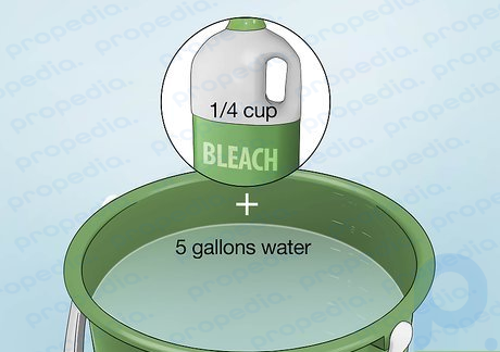 Schritt 2 Mischen Sie Bleichmittel und Wasser in einem Eimer, um eine Reinigungslösung herzustellen.
