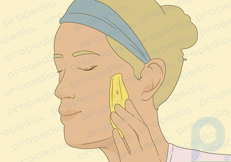 Step 3 Rub the inside of a banana peel on your face to minimize fine lines.