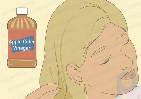 Step 4 Rinse your hair with apple cider vinegar after washing for a shiny finish.