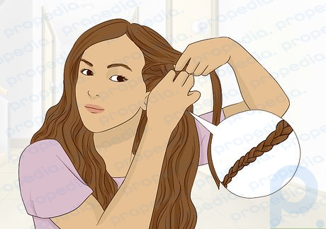 Step 2 Start a regular, mini braid on the side of your head.