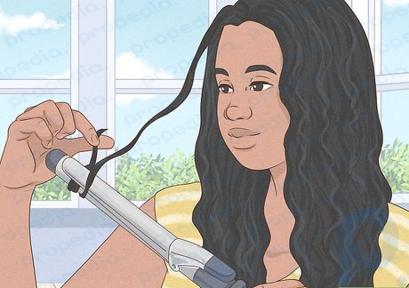 Step 2 You can use a few well-placed curls to disguise the relaxed hair.