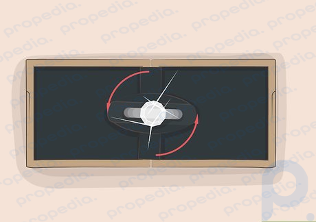 Paso 3 Pruebe con una caja de anillos giratorios cinéticos si desea exhibir una propuesta única.