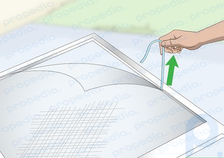 Step 2 Pull the splines out of the door frame groove with steady, firm pressure.