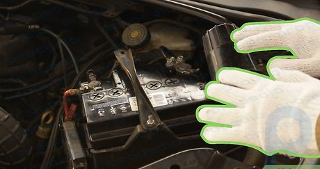 Step 2 Wear safety goggles and rubber gloves before touching the dead car battery in any way.