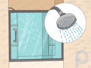 Cómo instalar una puerta de ducha de vidrio