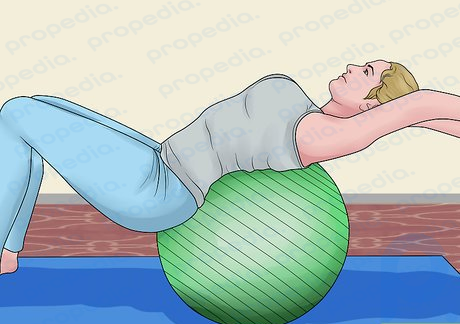 Step 7 Bounce on a therapy ball.